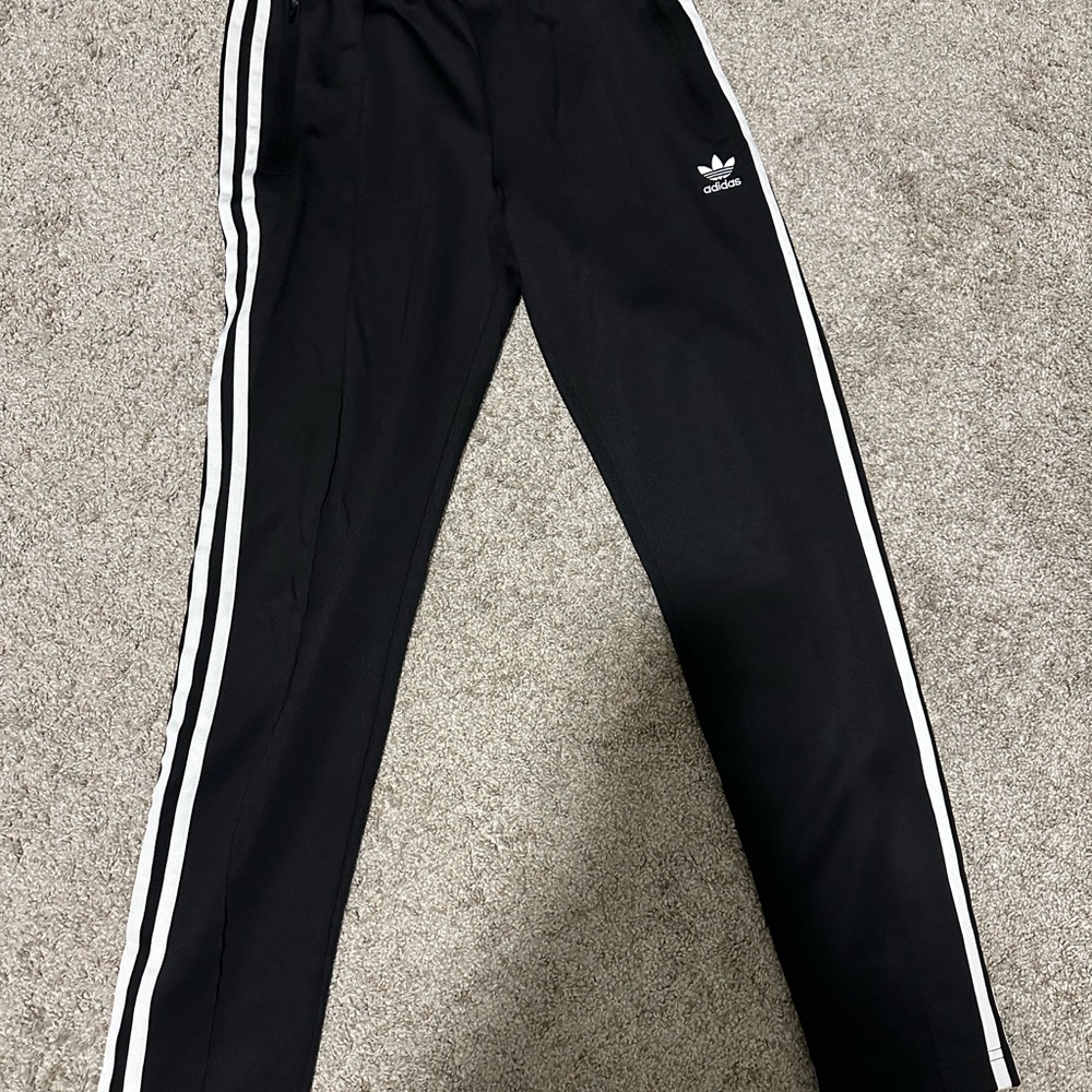 Adidas women’s  Black trainer pants with White Stripes